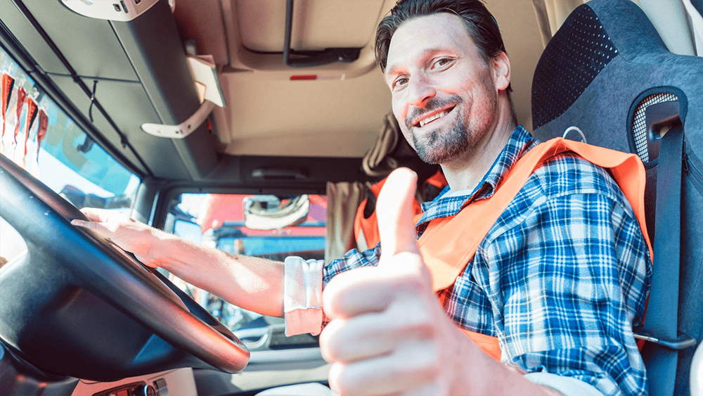 truck driver giving a thumbs up