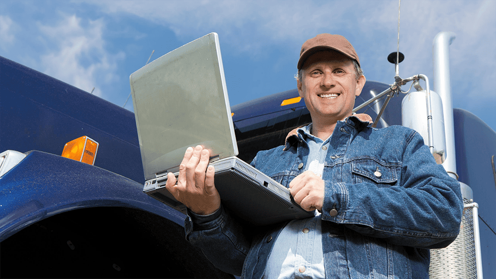 truck driver with a laptop